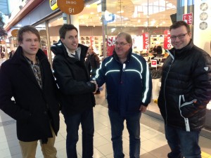 Shaking hands on the agreement. From left: Motonet Product Coordinator Teemu Pajulo, Fairpoint Marketing Manager Thomas Petersen, Motonet Product Manager Jorma Vataja, and Motonet Product Coordinator Nikolai Holttinen.